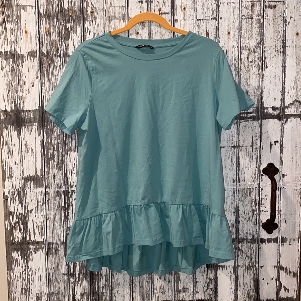 Teal blue high low ruffle bottom top